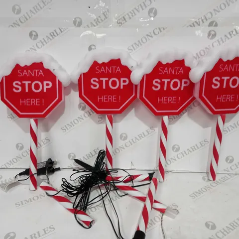 BOXED FESTIVE SET OF PRELIT SANTA STOP HERE STAKES