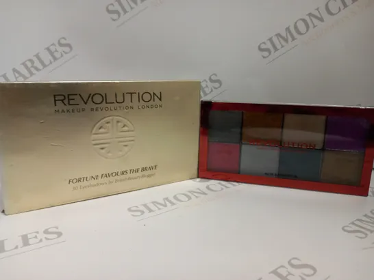 APPROXIMATELY 12 ASSORTED REVOLUTION BEAUTY PRODUCTS TO INCLUDE FORTUNE FAVOURS THE BRAVE EYESHADOW AND POSSESSED GLITTER PALETTE 