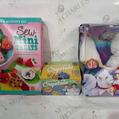 BOX OF APPROXIMATELY 20 ASSORTED TOYS AND GAMES TO INCLUDE GROW YOUR OWN CRYSTALS, MINI TREATS PLUSHIES TO STITCH, ELF PETS ARCTIC FOX, ETC