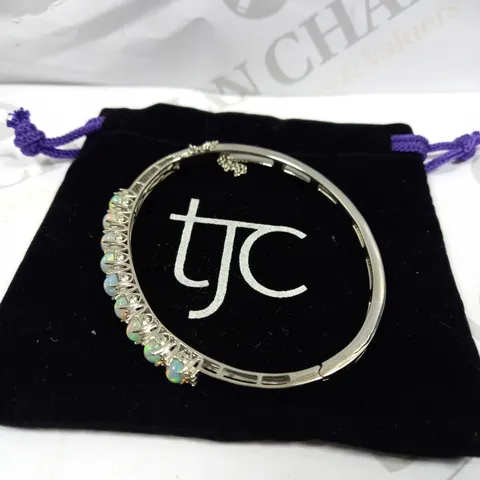 TJC ETHIOPIAN WELO OPAL AND NATURAL CAMBODIAN ZIRCON BANGLE