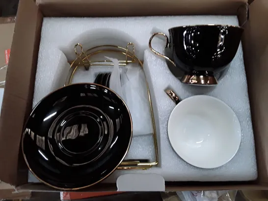 BOXED DUJUSY 4-PIECE CUP AND SAUCER SET