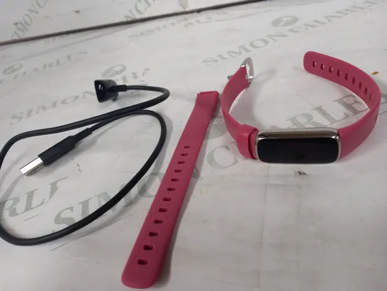 BOXED FITBIT LUXE ORCHID HEALTH AND FITNESS TRACKER 