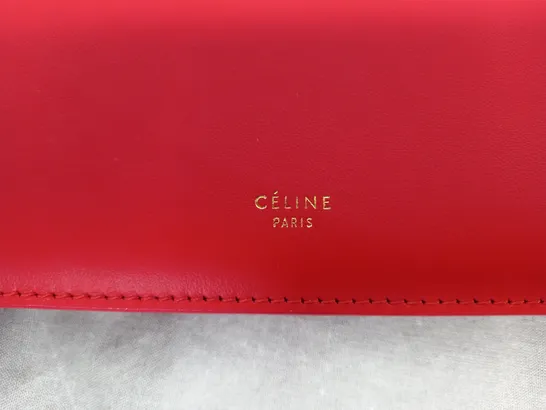 CELINE PARIS IN ORANGE CLUTCH BAG