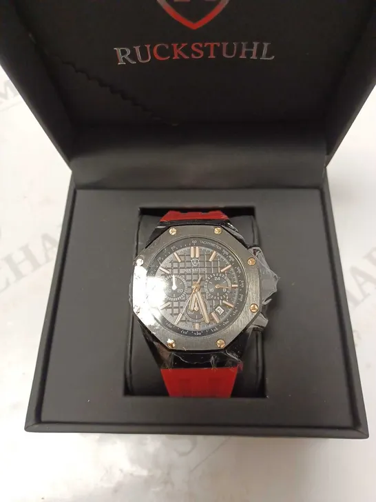 RUCKSTUHL OCTAGONAL BLACK TRIPLE DIAL STUD RED RUBBER STRAP WATCH