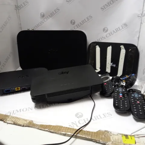 BOX OF SKY BOX'S AND REMOTES 