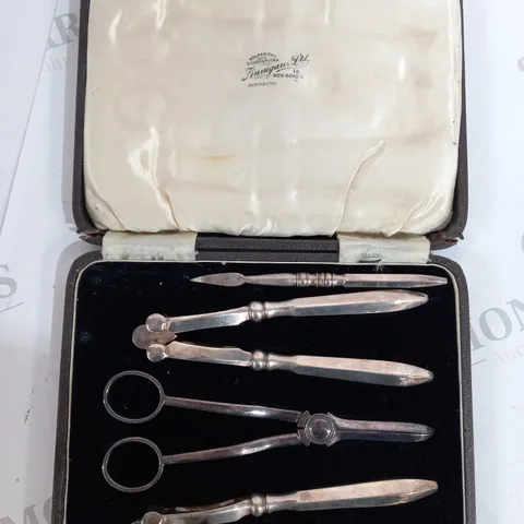 Finnigan's ltd goldsmiths and silversmiths Manchester nut cracker set and pickers 