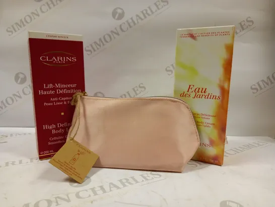 LOT OF APPROX 6 CLARINS PARIS SKIN CARE PRODUCTS TO INCLUDE SMOOTHING BODY CREAM, HIGH DEFINITION BODY LIFT, MINI GIFT BAG 