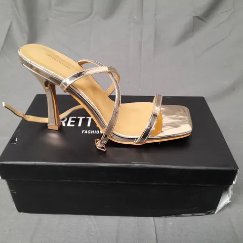 BOXED PAIR OF PRETTY LITTLE THING HEELS IN GOLD METALLIC SIZE UK 5