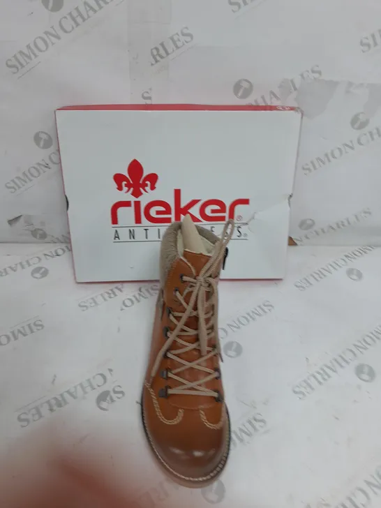 BOXED PAIR OF RIEKER WATER RESISTANT HIKING BOOTS IN BROWN ZIP UP SIZE 4