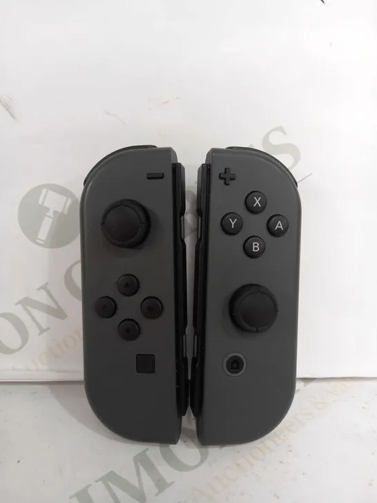 SET OF 2 NINTENDO SWITCH CONTROLLERS IN BLACK