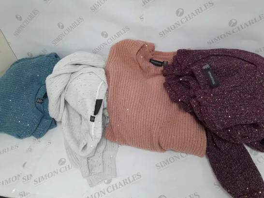 LARGE BOX OF ASSORTED CLOTHING ITEMS TOO INCLUDE TOPS , TROUSERS AND JUMPERS COMING IN DIFFERENT COLOURS AND SIZES 