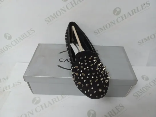 BOXED PAIR OF CASANDRA SLIP ON SHOES IN BLACK SIZE 4