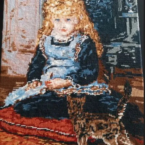 UNFRAMED CROSS STICH OF YOUNG GIRL WITH A CAT