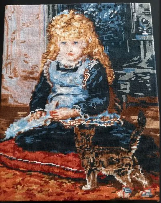 UNFRAMED CROSS STICH OF YOUNG GIRL WITH A CAT