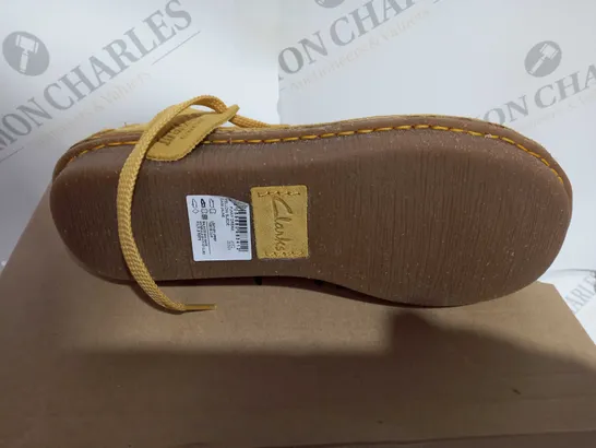 BOXED PAIR OF CLARKS FUNNY DREAM YELLOW SUEDE IN SIZE 6 