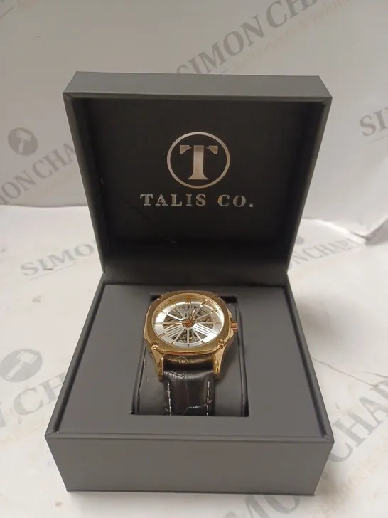 MEN’S TALIS CO  9185 AUTOMATIC SKELETON WATCH – BLACK DIAL – GOLD COLOUR CASE – GLASS EXHIBITION CASE BACK – LEATHER STRAP