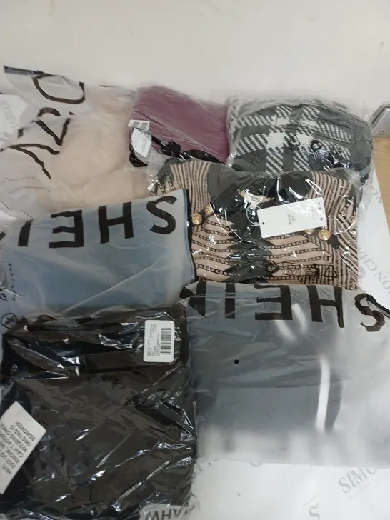 LARGE BOX OF ASSORTED CLOTHING ITEMS IN VARIOUS COLOURS AND SIZES INCLUDING TROUSERS , TOPS AND JUMPERS 