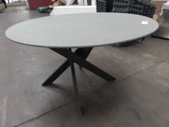 CIRCULAR COVERED GLASS TOPPED TABLE ON BLACK BASE