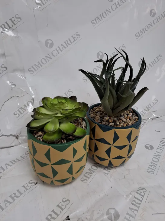 2 X FAUX POTTED PLANTS 