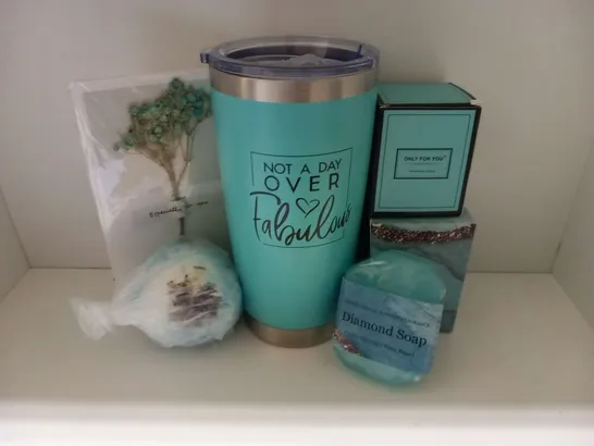  BRAND-NEW BOXED BE KURIOUS SPA PACKAGES THAT CONTAIN: 1X BATH BOMB, 1X DIAMOND SOAP, 1X BATH SALTS, 1X TUMBLER, 1X CANDLE AND 1X DRIED FLOWERS CARD.