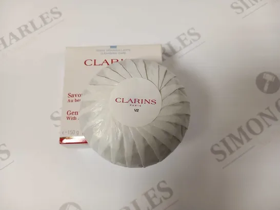 APPROXIMATELY 43 BOXED CLARINS PARIS GENTLE BEAUTY SOAP WITH SHEA BUTTER AND HAZLENUT OIL 150G EACH