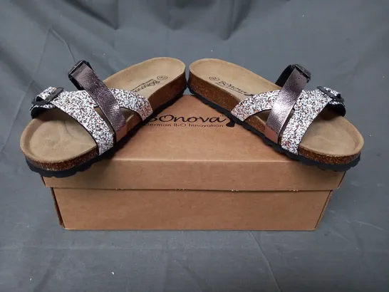 BOXED PAIR OF BONOVA OPEN TOE FLAT SANDALS IN BRONZE SIZE 4