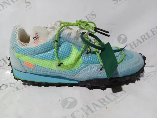 BOXED PAIR OF NIKE SHOES IN LIGHT BLUE/GREEN UK SIZE 7