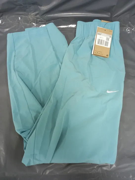 NIKE FAST WOMENS STANDARD FIT TROUSERS IN BLUE - XS