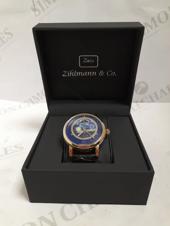 MENS ZIHLMANN & CO AUTOMATIC WATCH – Z150 – MOONPHASE DIAL – GLASS EXHIBITION BACKCASE - SILVER COLOUR CASE – BLACK LEATHER STRAP