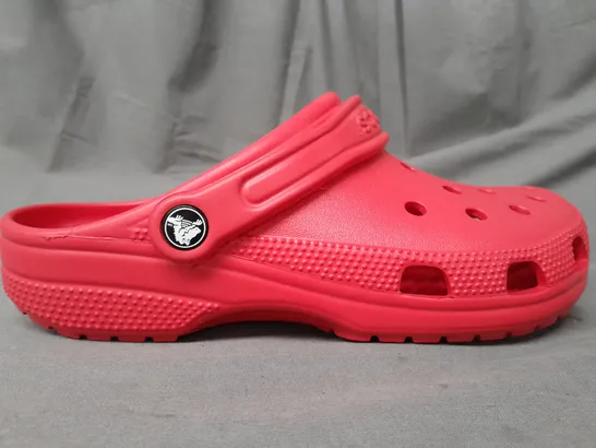 PAIR OF CROCS CLASSICS IN RED UK SIZE M6/W7