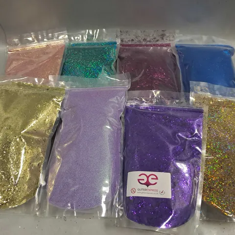 BOX OF APPROXIMATELY 20 SEALED ASSORTED GLITTER POUCHES TO INCLUDE - GOLD - PURPLE - PINK - ETC - COLLECTION ONLY