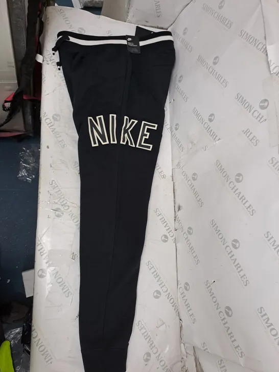 NIKE TRACK PANTS SIZE LARGE 