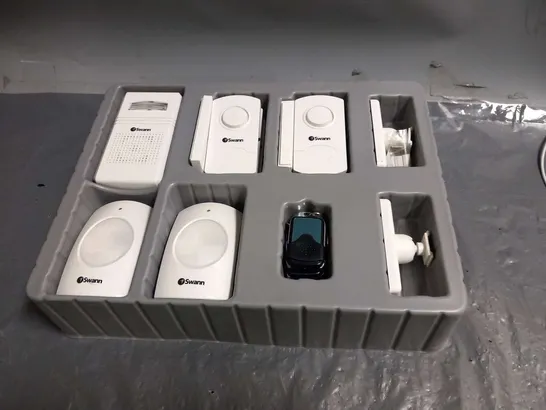 BOXED SWANN SECURITY SENSORS AND FOBS