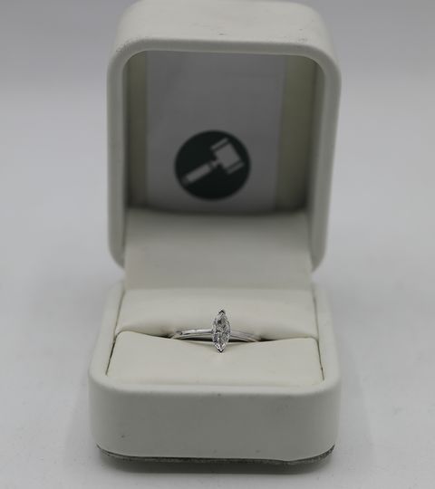 18CT WHITE GOLD SOLITAIRE RING SET WITH A MARQUISE CUT DIAMOND WEIGHING +0.45CT