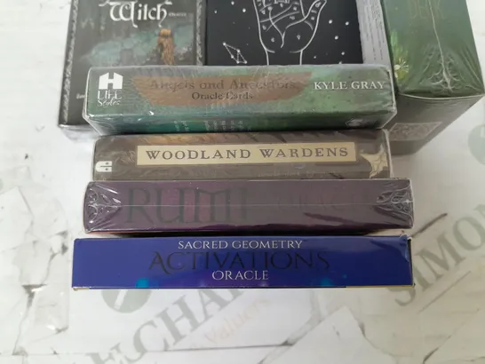 LOT OF 7 SEALED PACKS OF NEW AGE CARDS TO INCLUDE PALM READING CARDS, PRACTICAL SPELLS AND LUCY CAVENDISH SOLITARY WITCH ORACLE CARDS