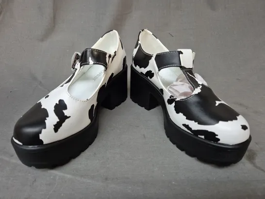 BOXED PAIR OF KOI SAI COW PRINT MARY JANES 'NETTIE EDITION' SIZE 3