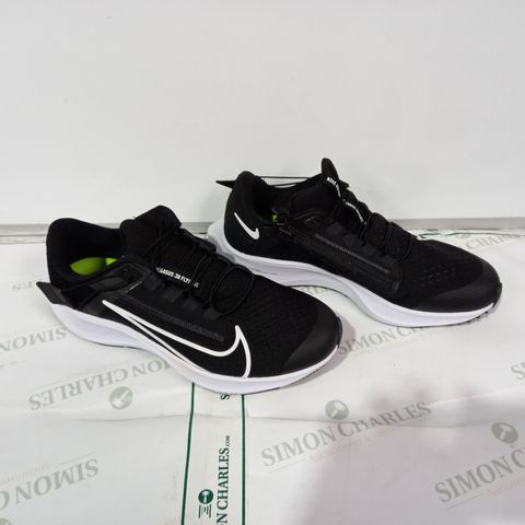 PAIR OF NIKE BLACK/WHITE TRAINERS SIZE 6
