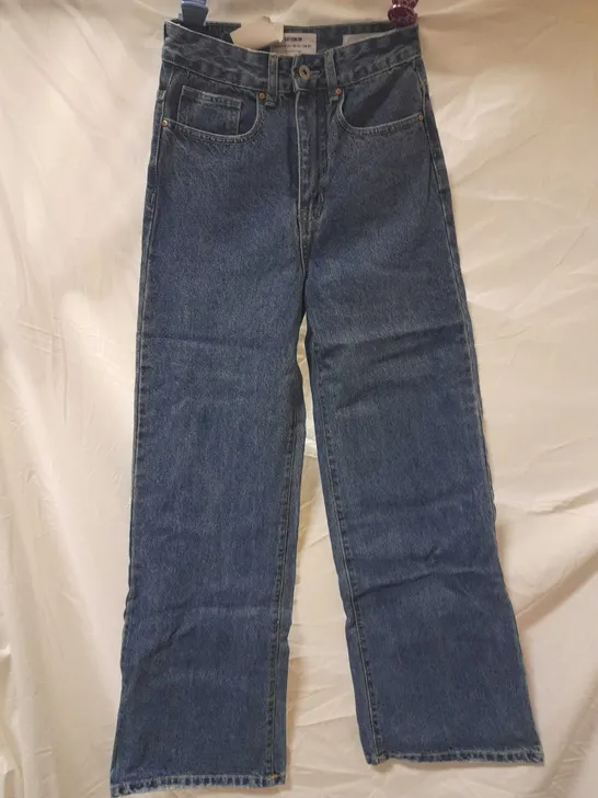 BOX OF APPROX 18 BRAND NEW COTTON ON LONG WIDE LEG COOGEE BLUE JEAN SIZE 6