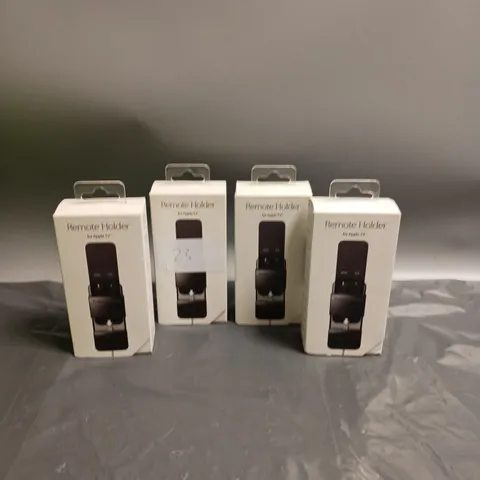 BXED LOT OF 4 REMOTE HOLDER FOR APPLE TV REMOTE
