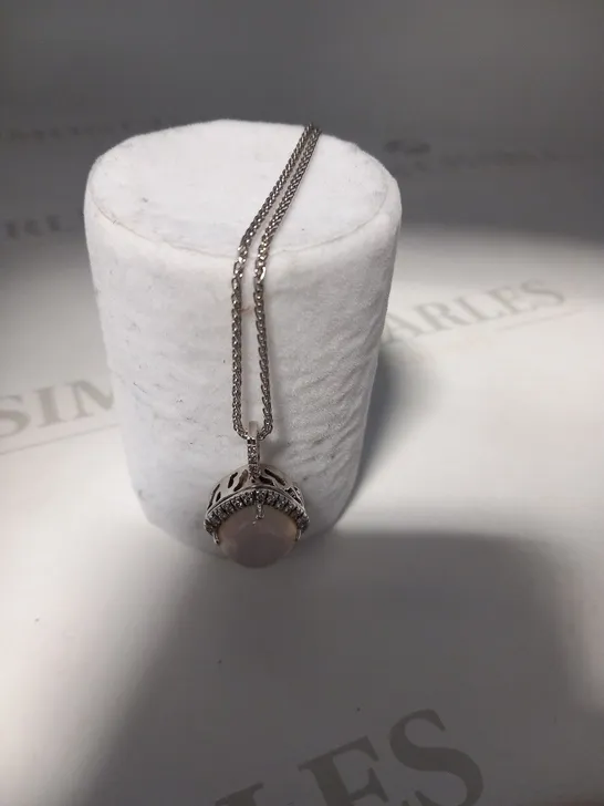 DESIGNER 18CT WHITE GOLD PENDANT ON CHAIN, SET WITH A ROSE QUARTZ CABACHON WITH DIAMOND HALO