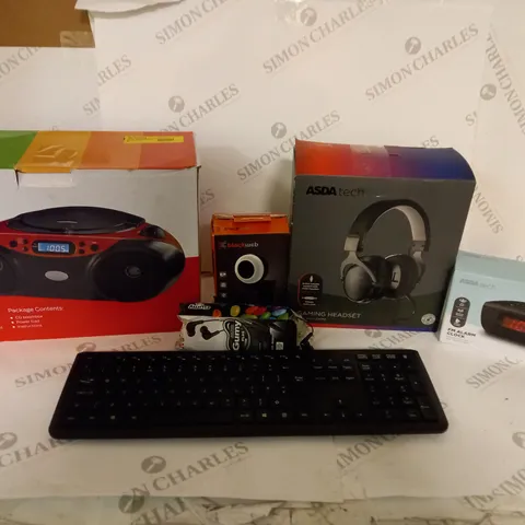 BOX OF APPROX 20 ASSORTED ITEMS INCLUDING POLAROID CD BOOMBOX, WIRELESS KEYBOARD AND WIRED GAMING HEADSET