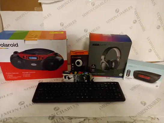 BOX OF APPROX 20 ASSORTED ITEMS INCLUDING POLAROID CD BOOMBOX, WIRELESS KEYBOARD AND WIRED GAMING HEADSET