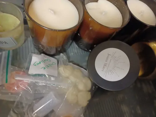 LOT OF APPROX 10 ASSORTED CANDLES TO INCLUDE YANKEE SNOWFLAKE KISSES CANDLE, YANKEE HOLIDAY GARLAND CANDLE, IKEA FENOMEN CANDLES. ETC 