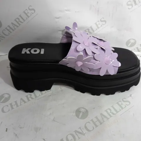 PAIR OF KOI VEGAN LEATHER PLATFORM SQUARE TOE SANDALS IN BLACK WITH PURPLE FLOWER DESIGN - SIZE 6