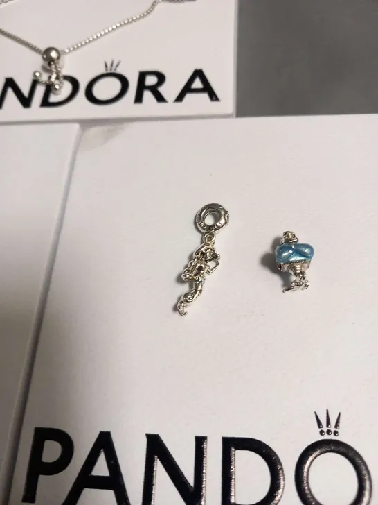 FOUR ASSORTED PANDORA PRODUCTS TO INCLUDE; BRACELTS AND CHARMS