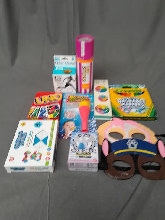 BOX OF ASSORTED TOYS AND GAMES TO INCLUDE UNO, CRAYOLA AND PAW PATROL MASKS