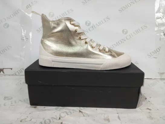 BOXED PAIR OF HUSH SKYE HI-TOP TRAINERS IN METALLIC GOLD COLOUR EU SIZE 40