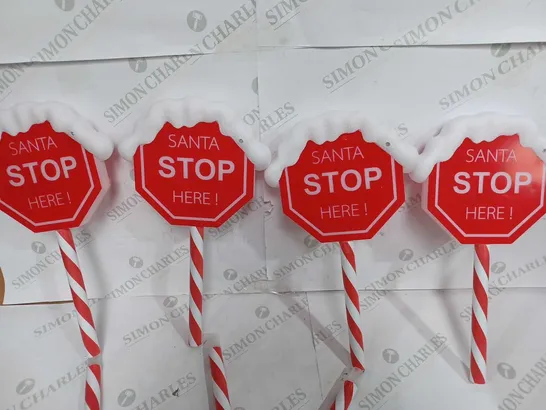 FESTIVE SET OF PRELIT SANTA STOP HERE STAKES