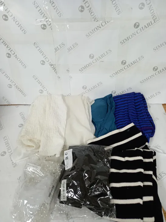 LARGE BOX OF ASSORTED CLOTHING ITEMS IN VARIOUS COLOURS AND SIZES INCLUDING TROUSERS , TOPS AND JUMPERS 