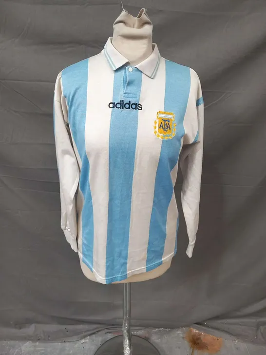 1994 ARGENTINA ADIDAS HOME FOOTBALL JERSEY NUMBERED 10 SIGNED BY DIEGO ARMANDO MARADONA WITH CERTIFICATE OF AUTHENTICITY